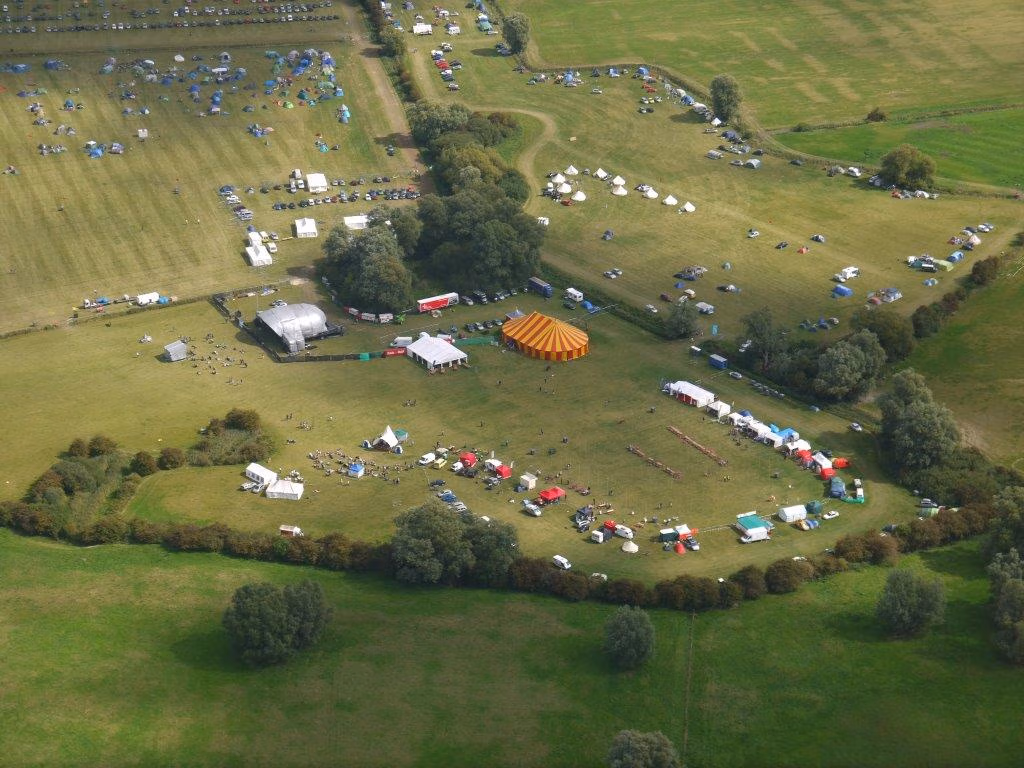 Aerial view of the Fields of LodeStar with catering area and camping fields.